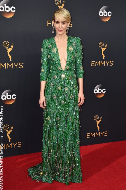 Newly appointed Emmy winner Sarah Paulson stepped onto the red carpet and jaws literally dropped. The People v. OJ Simpson star made quite a sartorial statement in her heavily embellished, emerald green Prada dress. She opted to keep her decolletage bare to show off the gown’s dangerously low v-neck, and instead completed her killer look […]