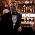James Bond (Daniel Craig) and Paloma (Ana de Armas)