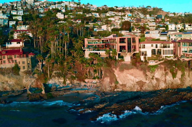 The Oppenheim Group expands to Orange County, where an all-new real estate team shows off lavish oceanfront listings and big personalities make waves.